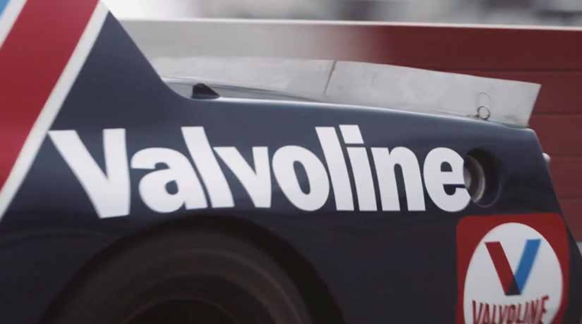 Tail end of vintage stock car with Valvoline logo